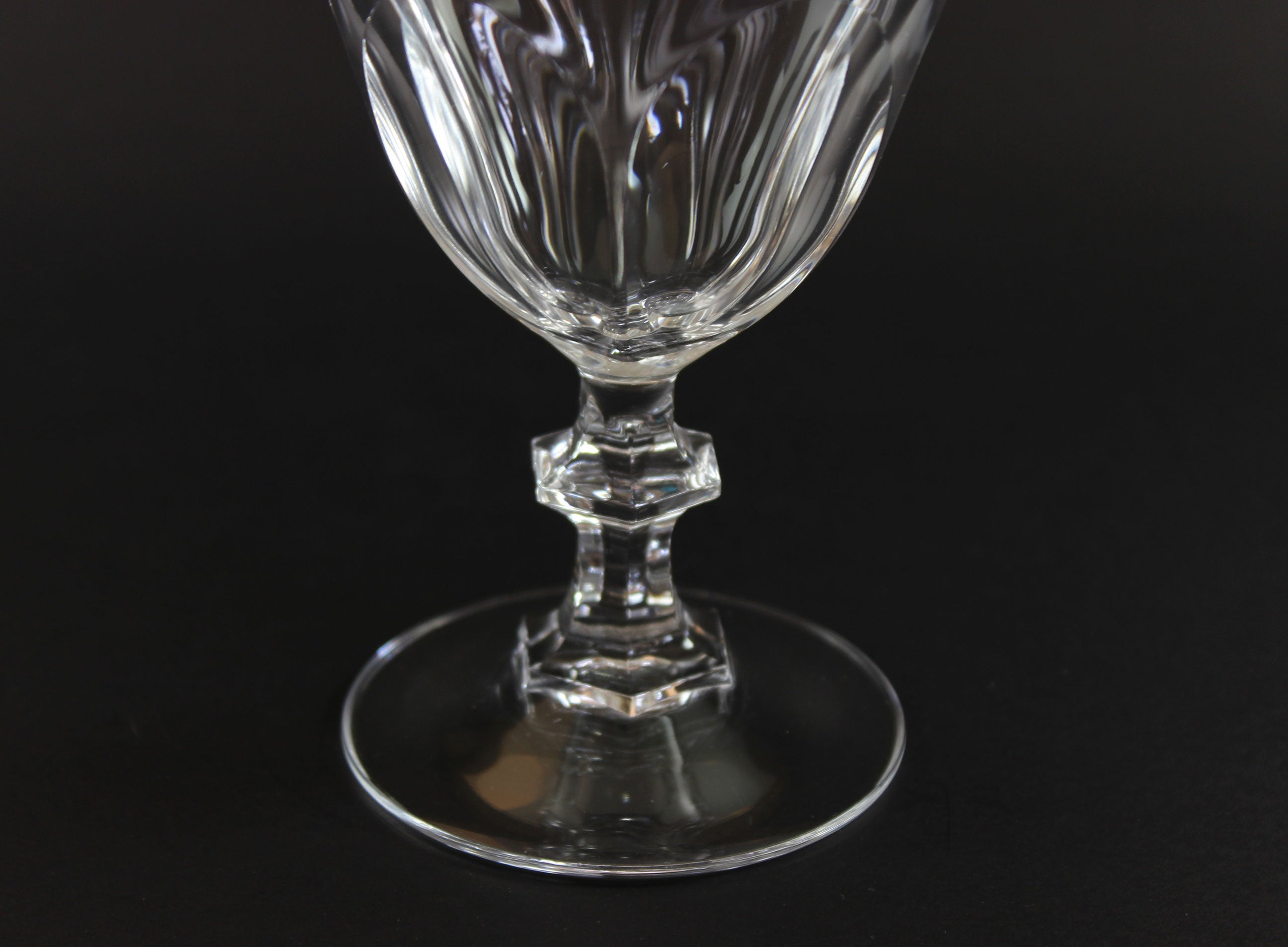 Clear crystal goblet on a black background