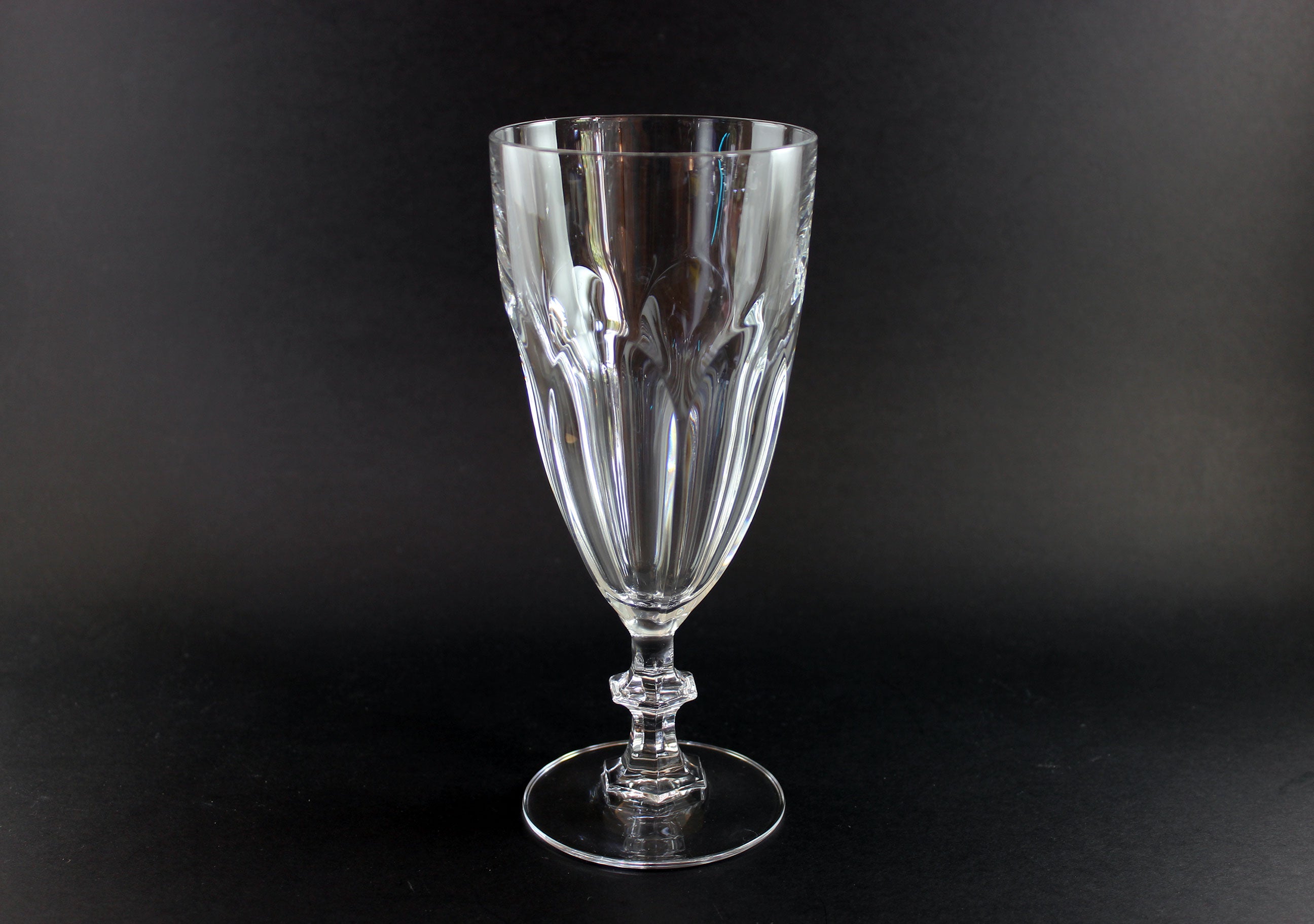 Clear crystal goblet on a black background