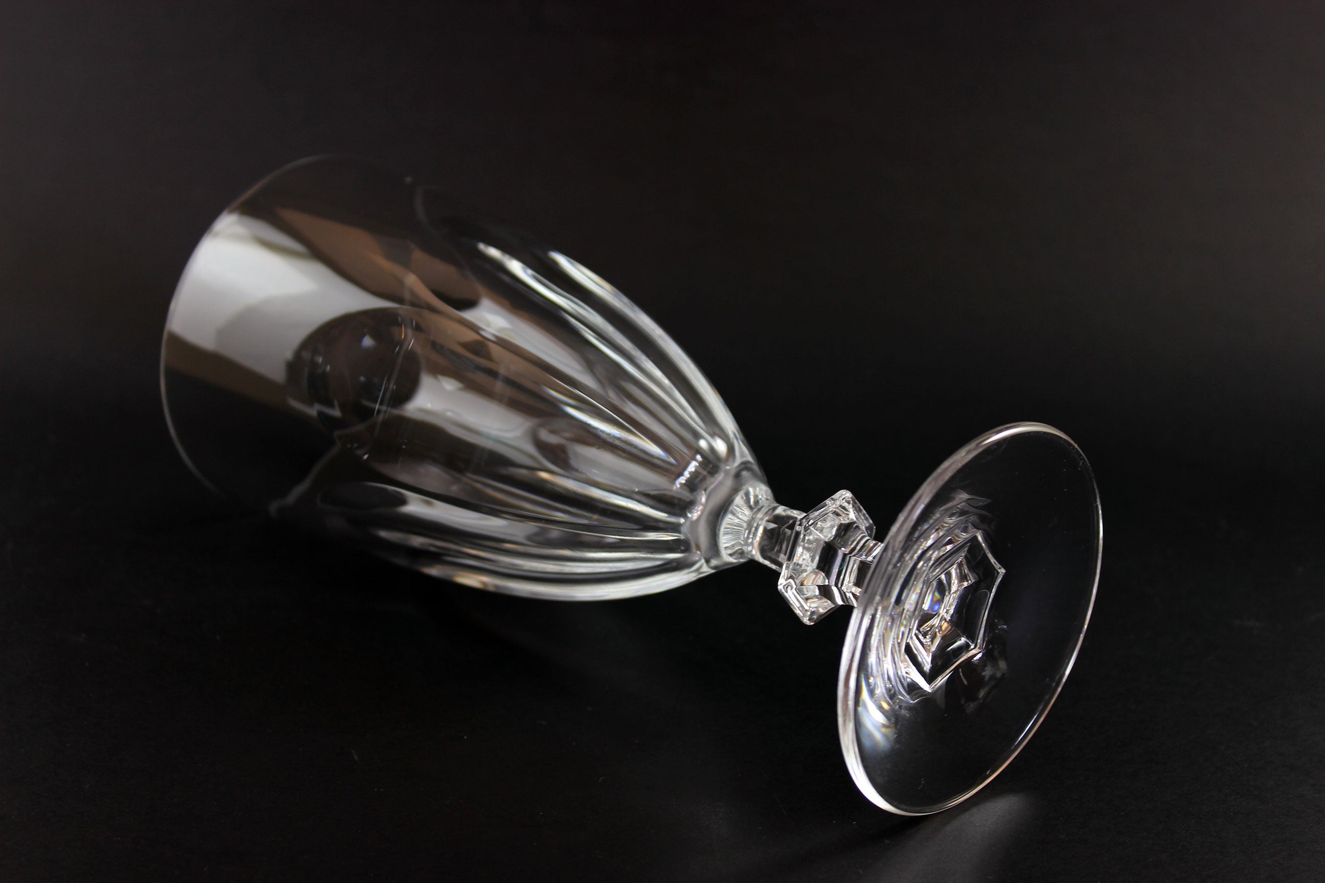 Clear crystal goblet on a black background