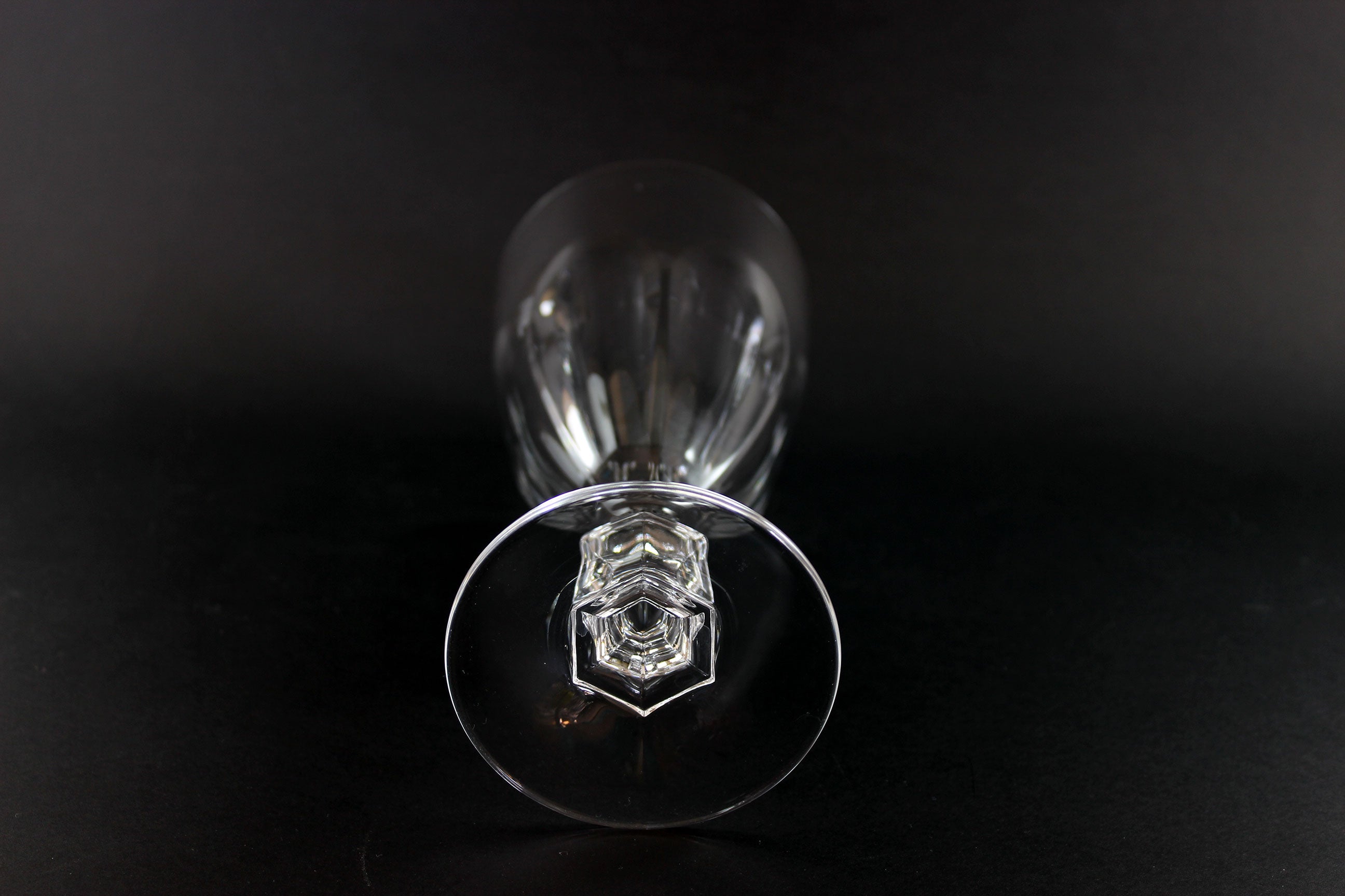 Clear crystal goblet on a black background