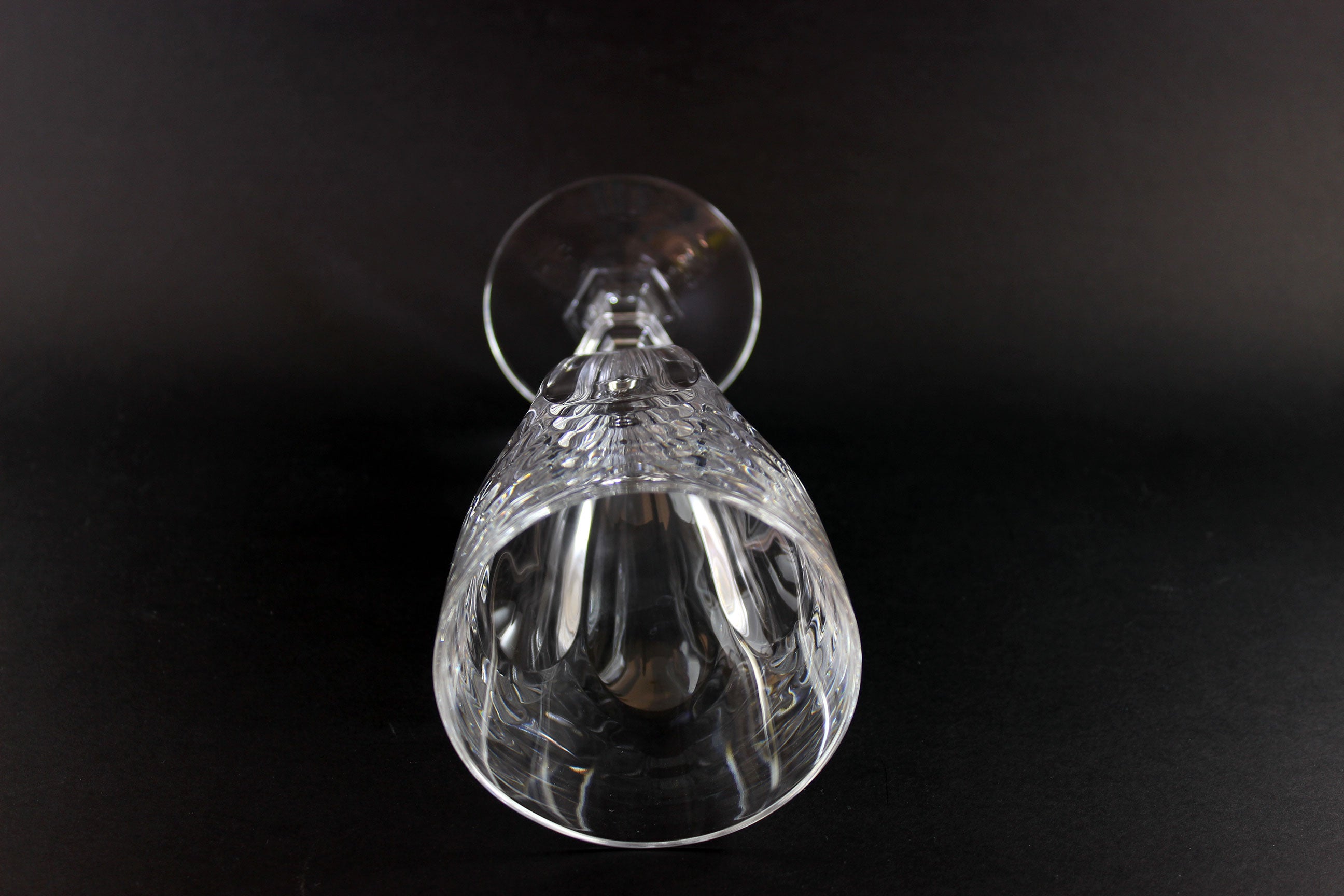 Clear crystal goblet on a black background