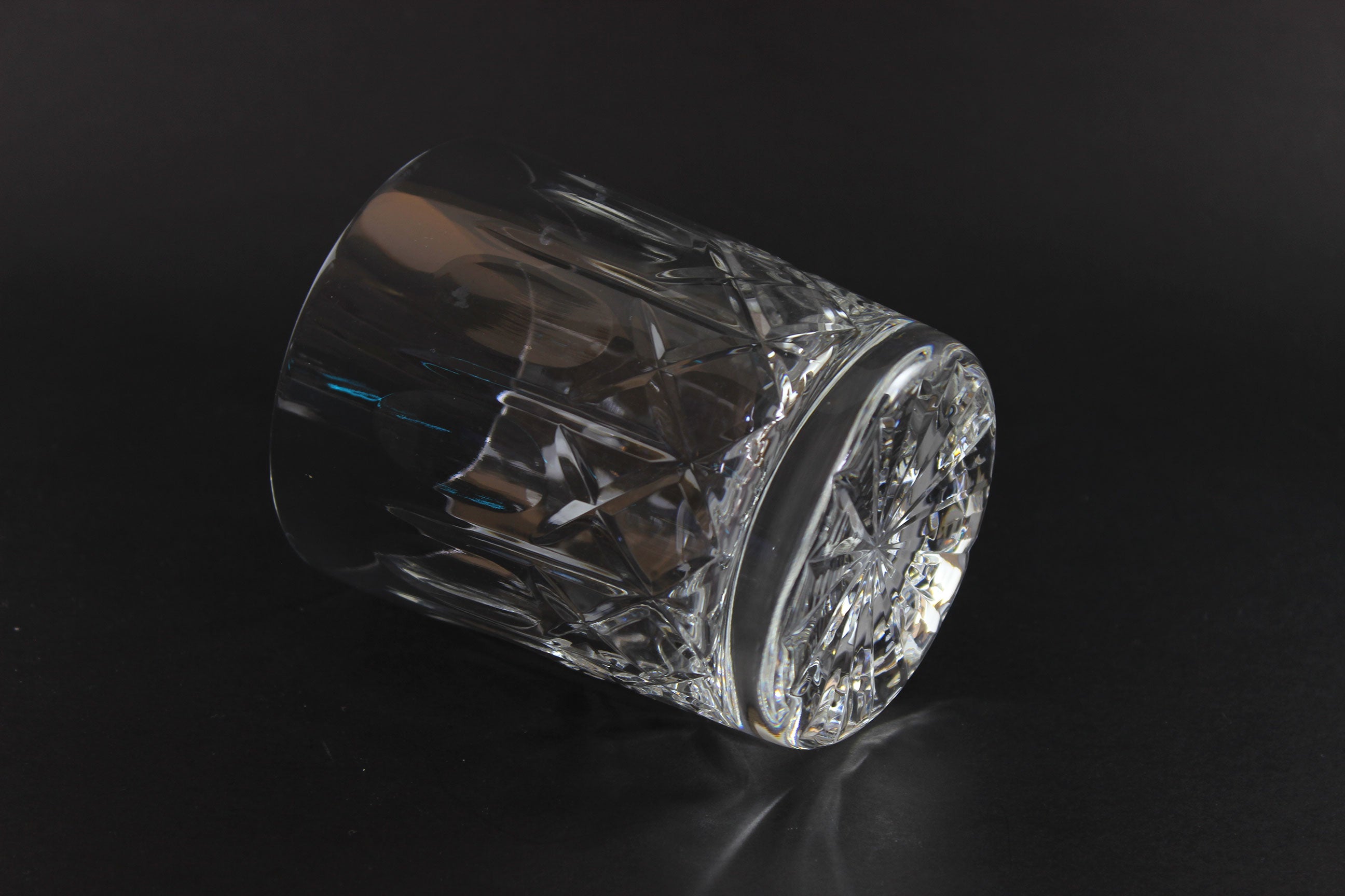 Cut Crystal Whiskey Glass on Black Background