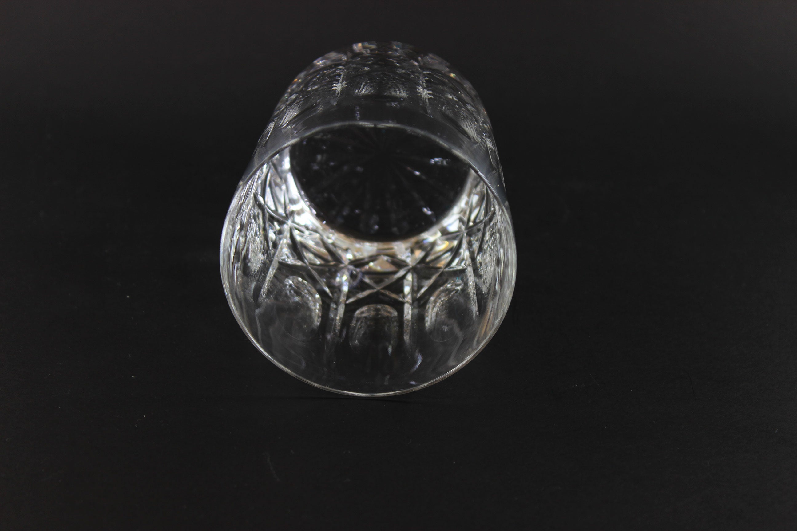 Cut Crystal Whiskey Glass on Black Background