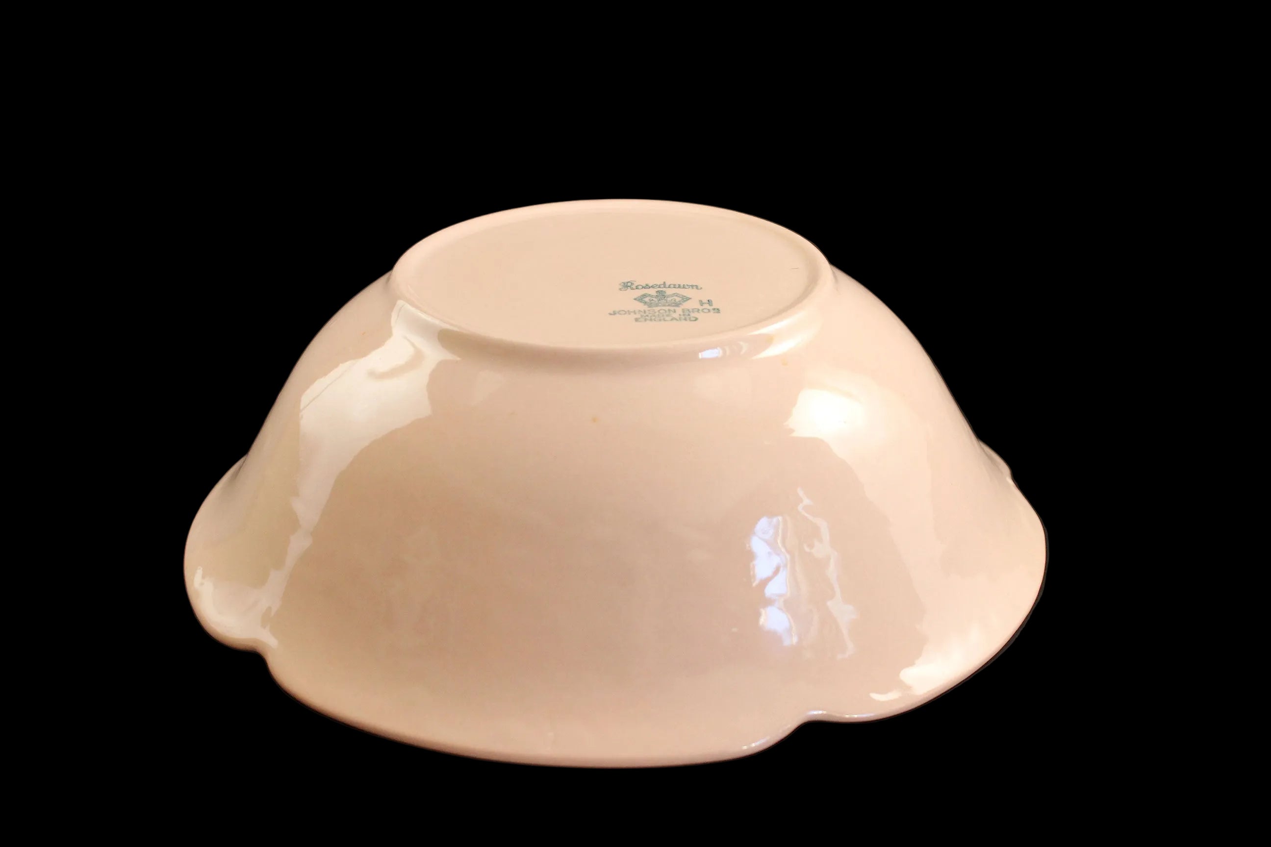 Rose ceramic bowl on a black background