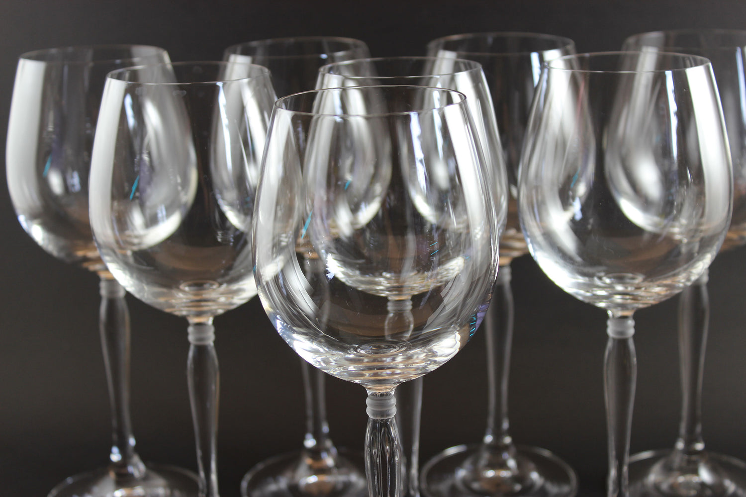 Set of Spiegelau Arabeske clear wine glasses on a dark background