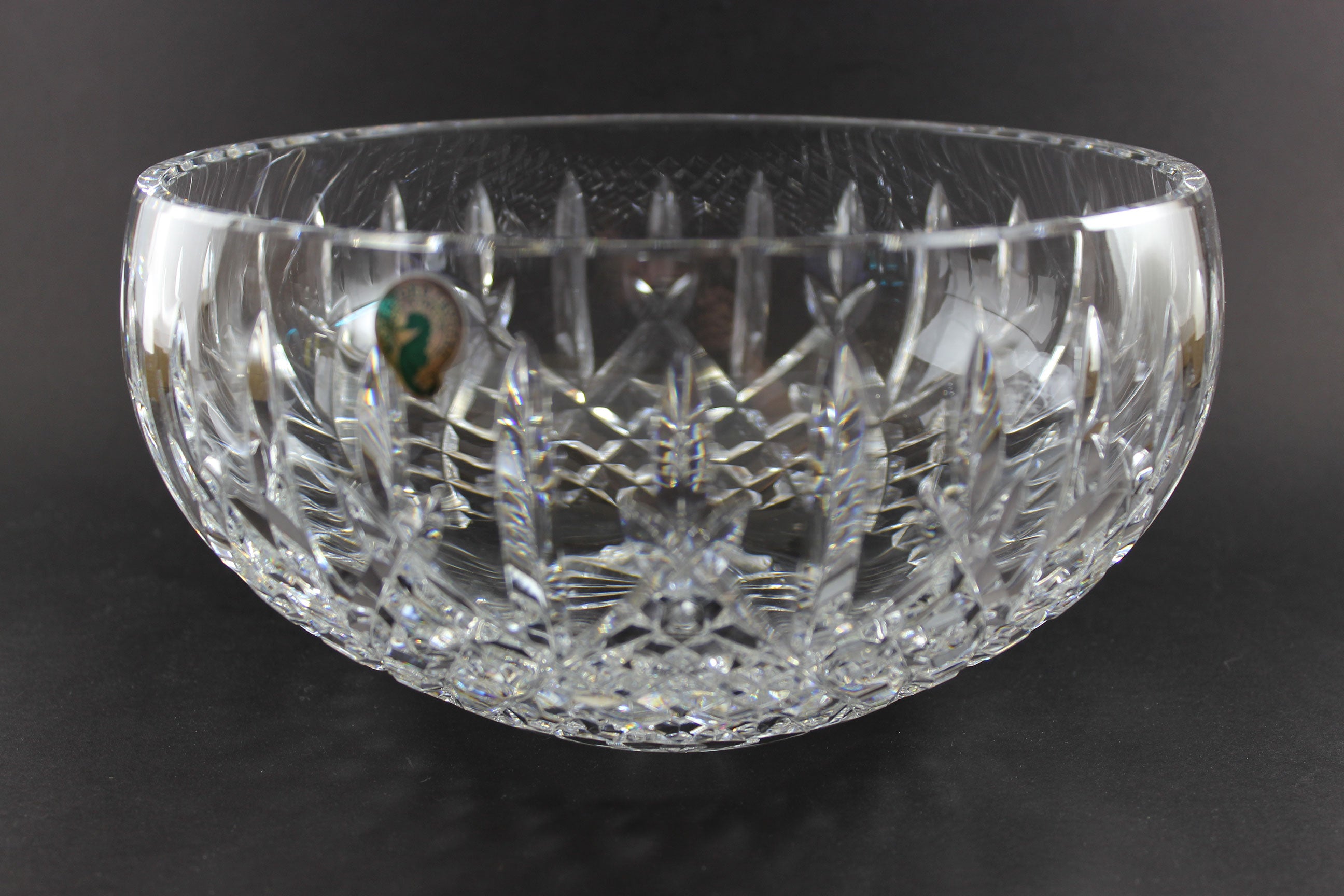 Waterford cut crystal bowl with intricate designs on a black background