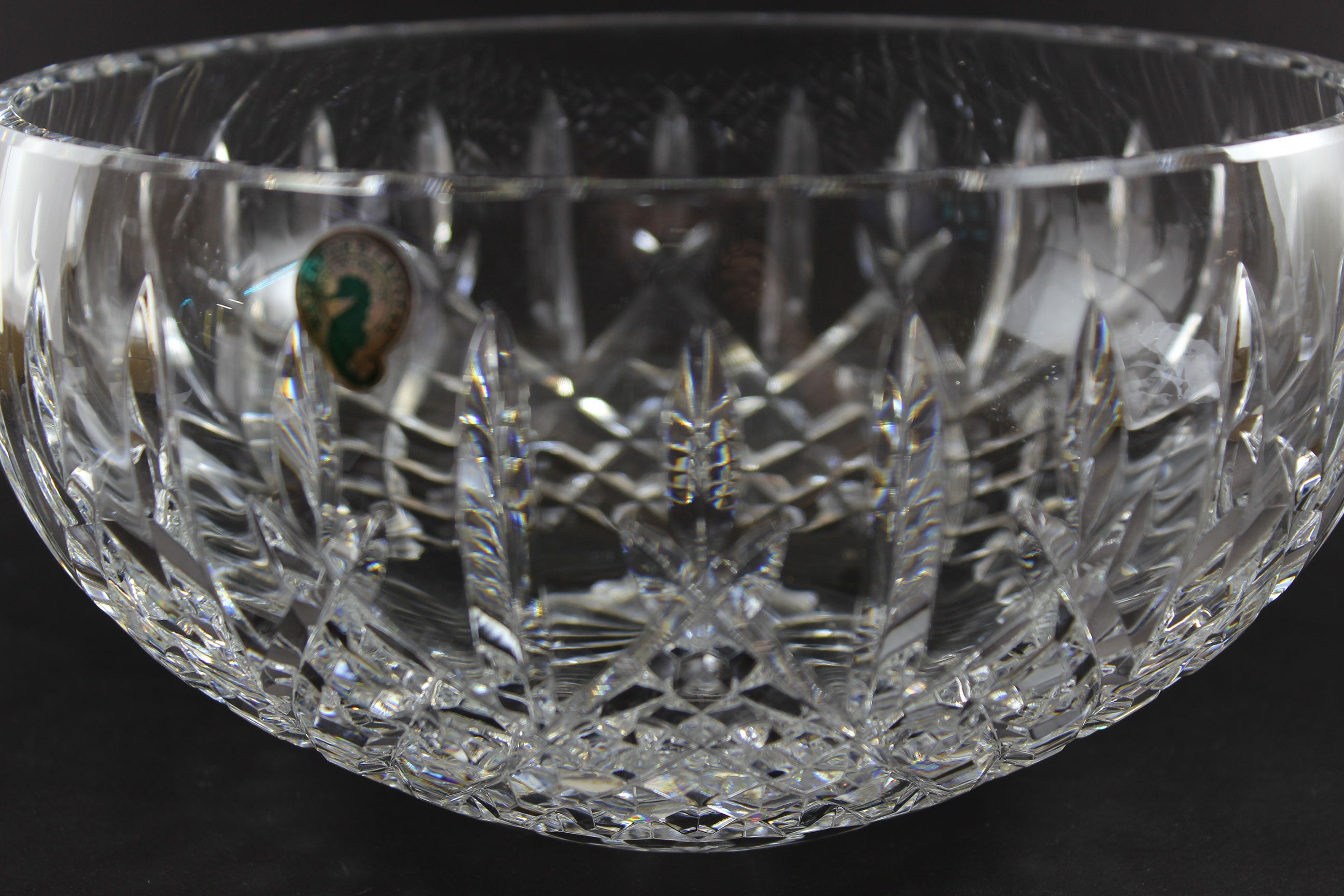 Waterford cut crystal bowl with intricate designs on a black background