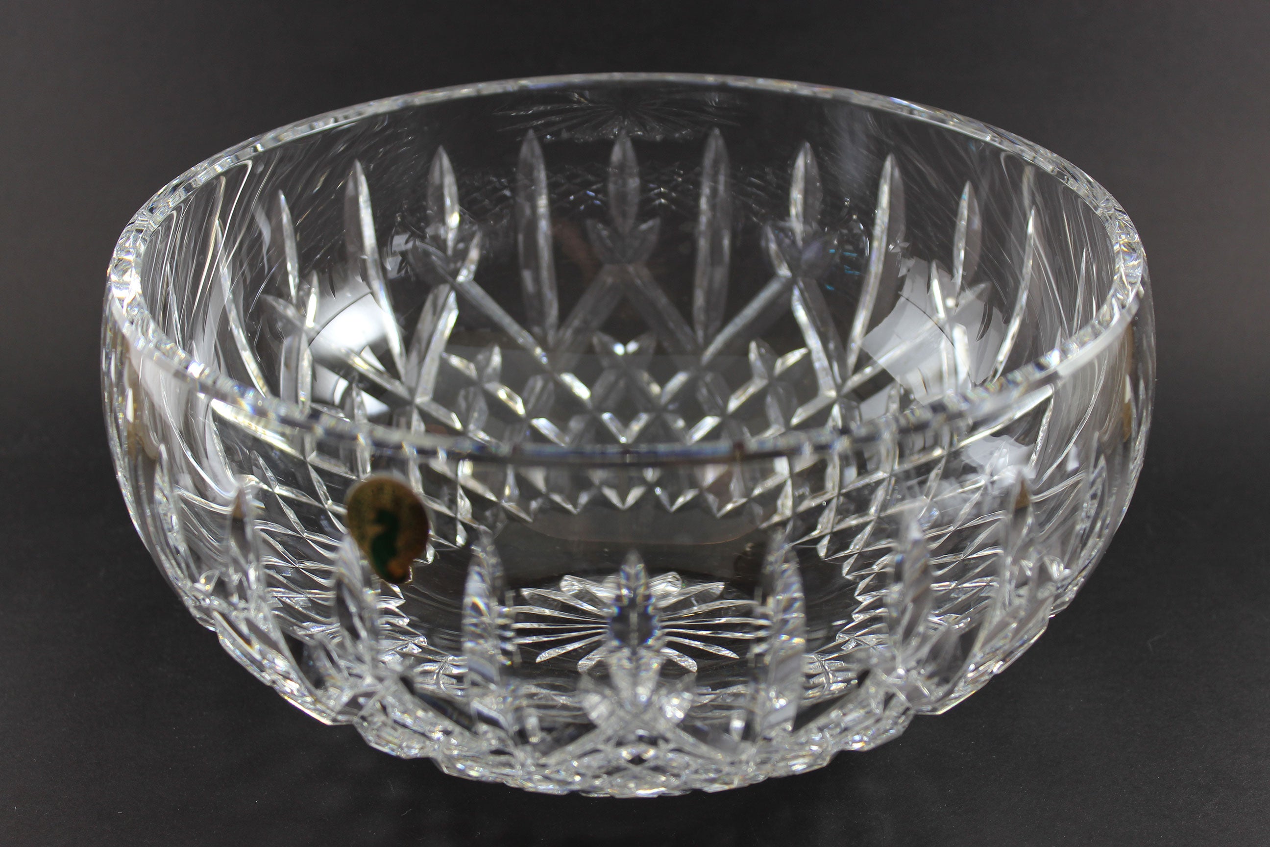 Waterford cut crystal bowl with intricate designs on a black background