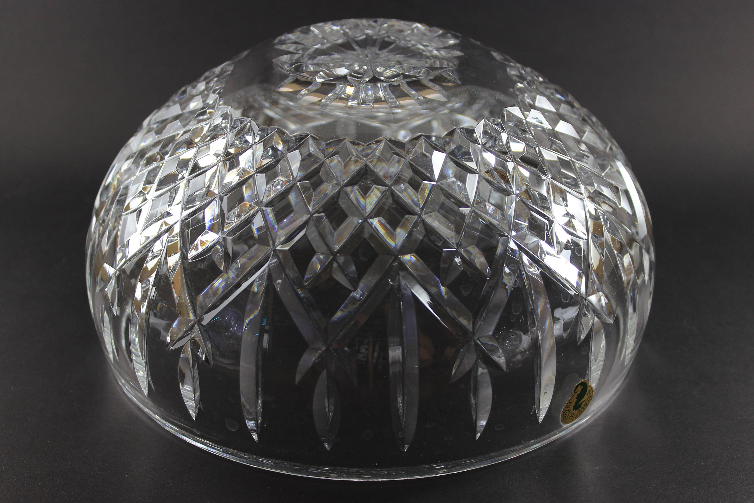 Waterford cut crystal bowl with intricate designs on a black background
