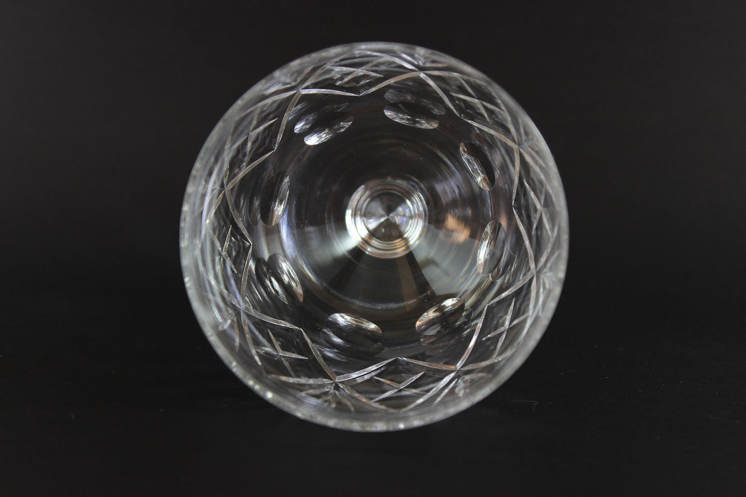 Clear crystal water goblet on a black background