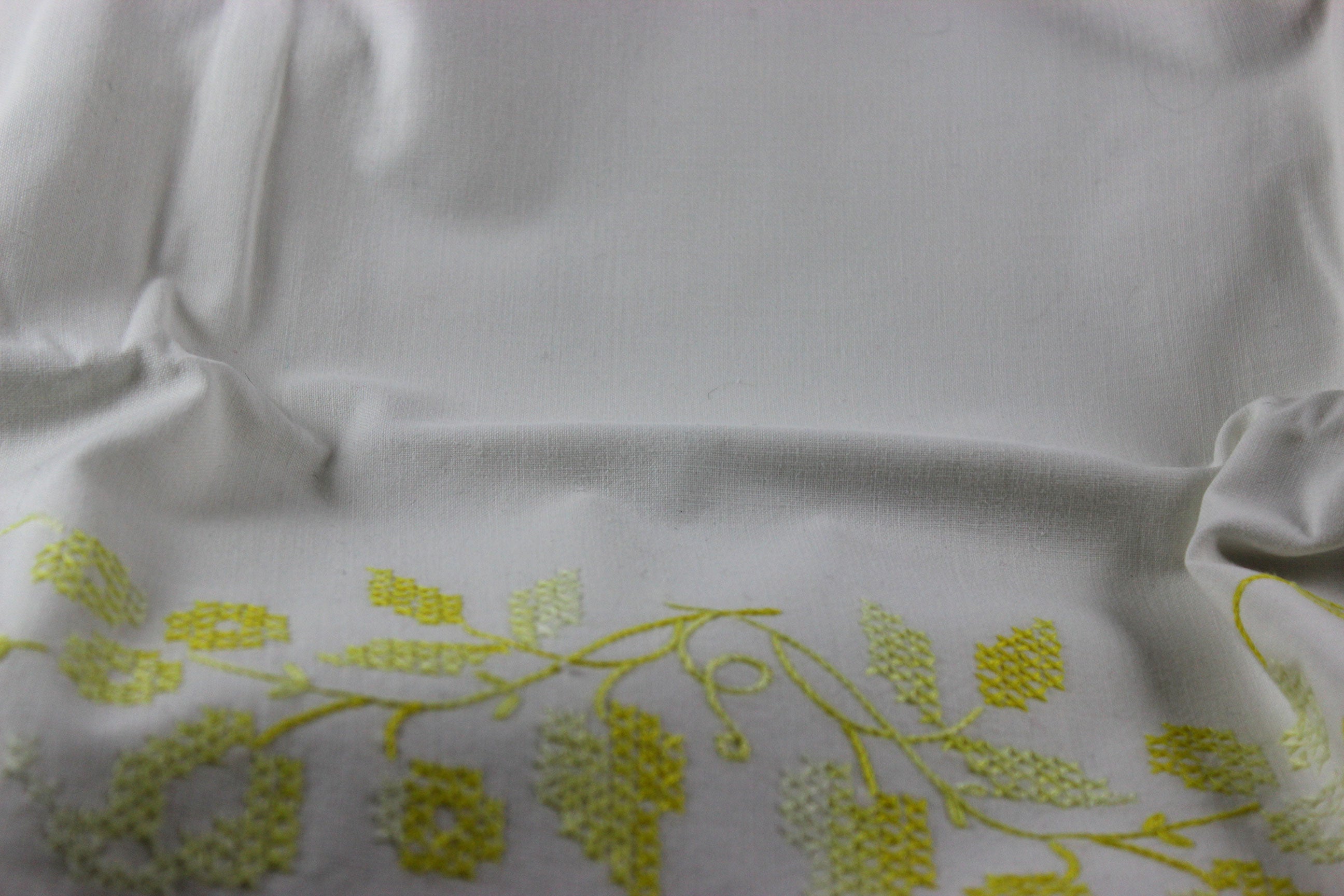 Yellow Cross Stitched and Crochet Edged Pillowcases