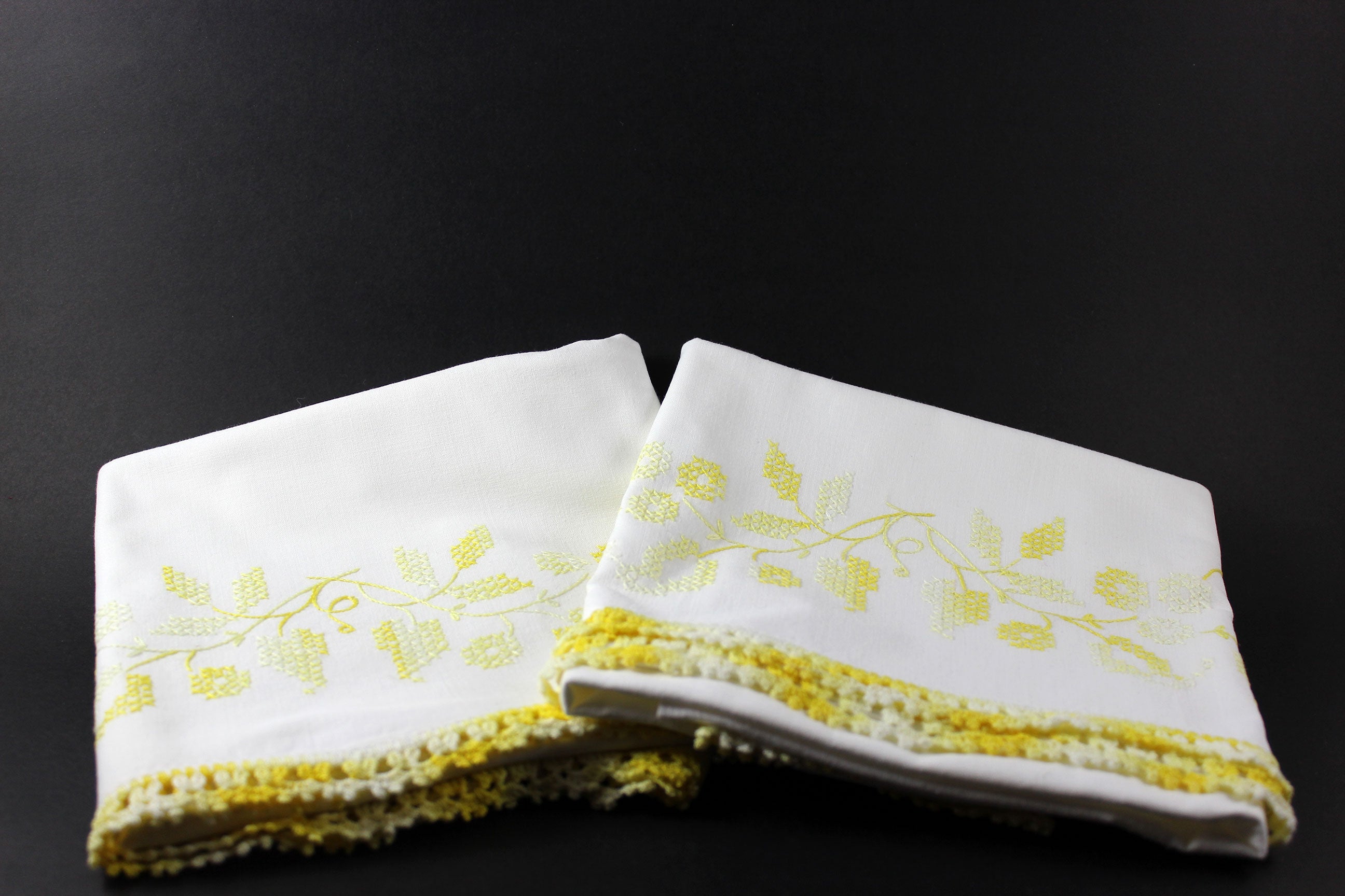 Yellow Cross Stitched and Crochet Edged Pillowcases