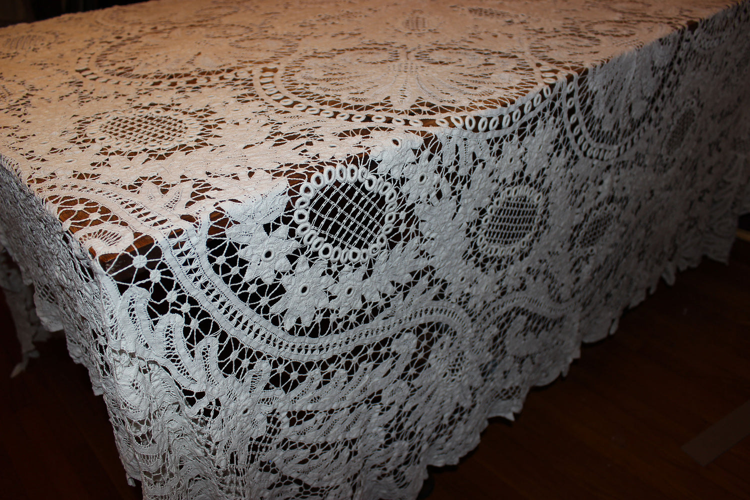 Lace tablecloth on a wooden table