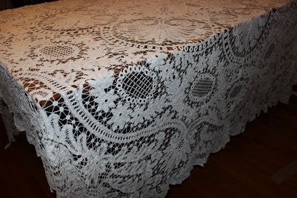 Lace tablecloth on a wooden table