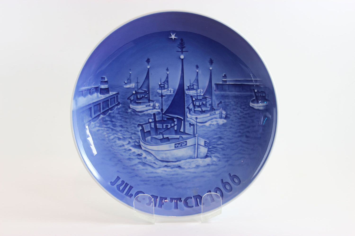 1966 Bing and Grondahl Blue and White Christmas Plate with sailboats in the harbour.