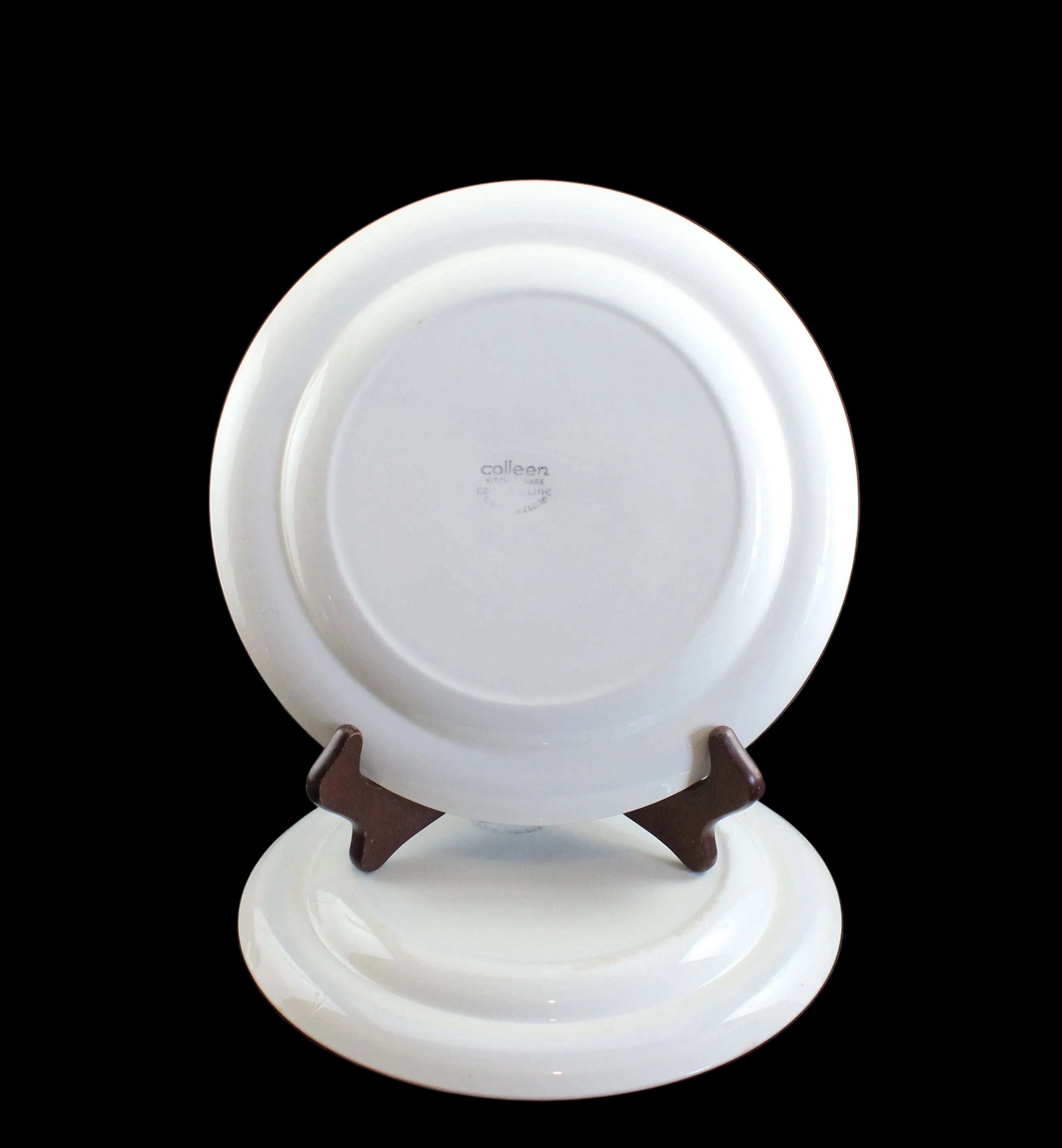 White ceramic plate on a black background