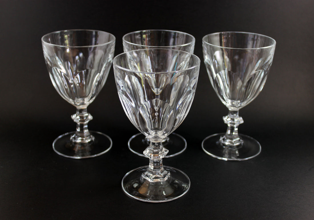 Clear, crystal Claret glasses on black background.
