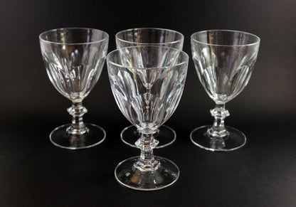 Clear, crystal Claret glasses on black background.