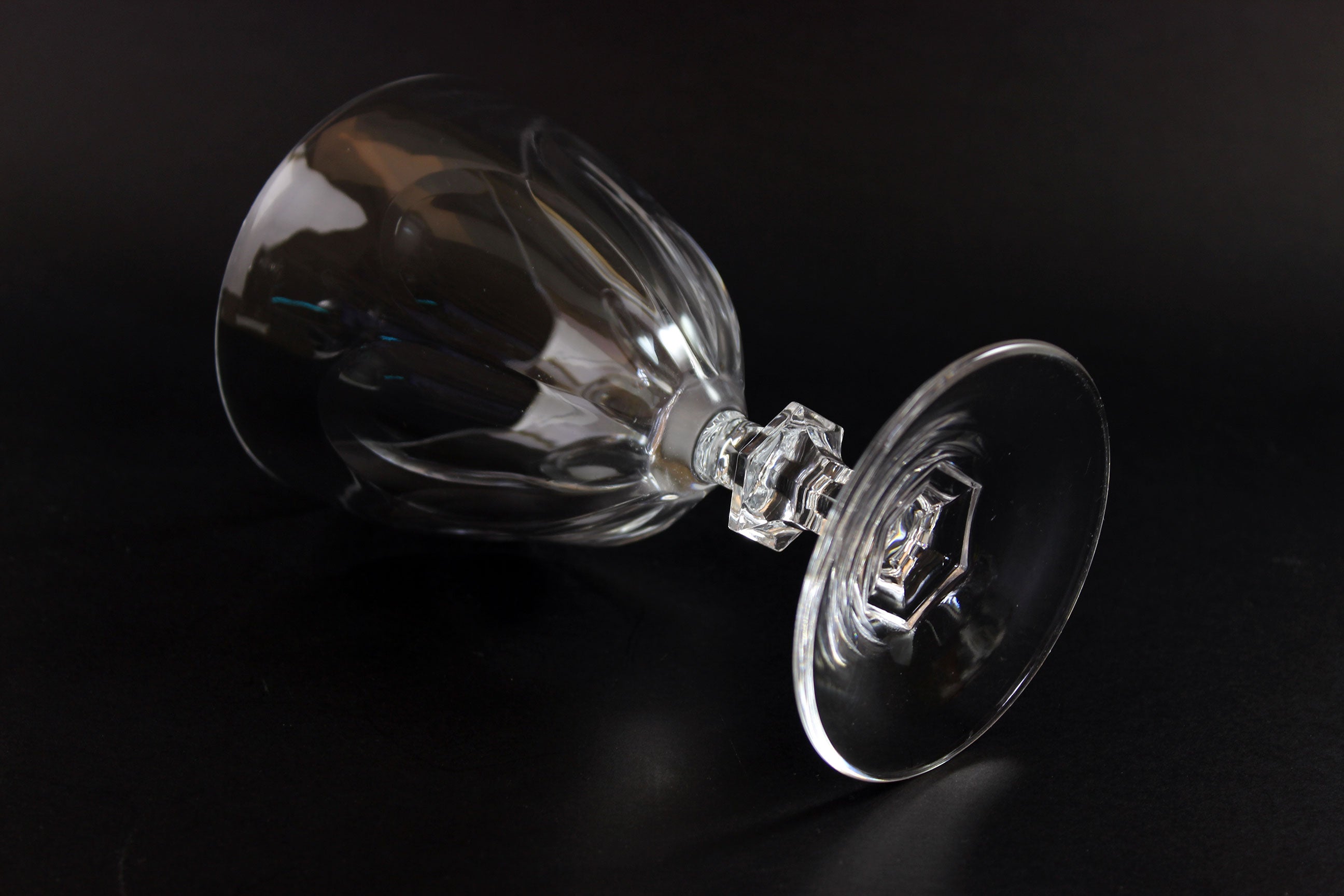 Clear crystal goblet on a black background
