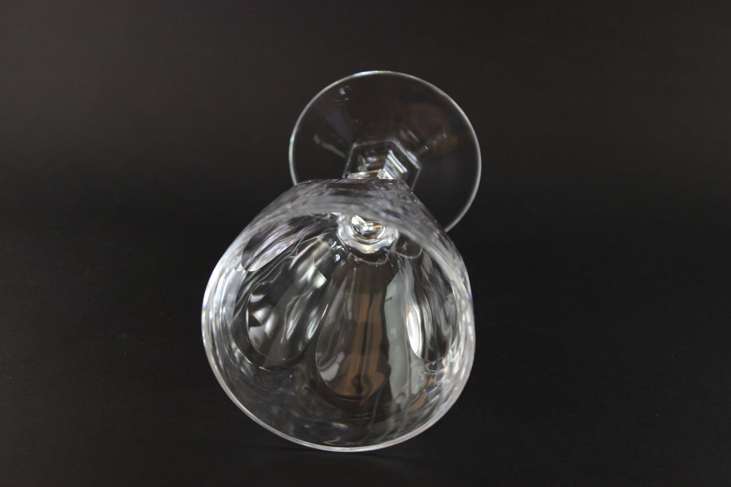 Clear crystal goblet on a black background