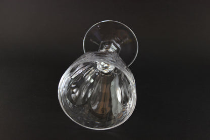 Clear crystal goblet on a black background