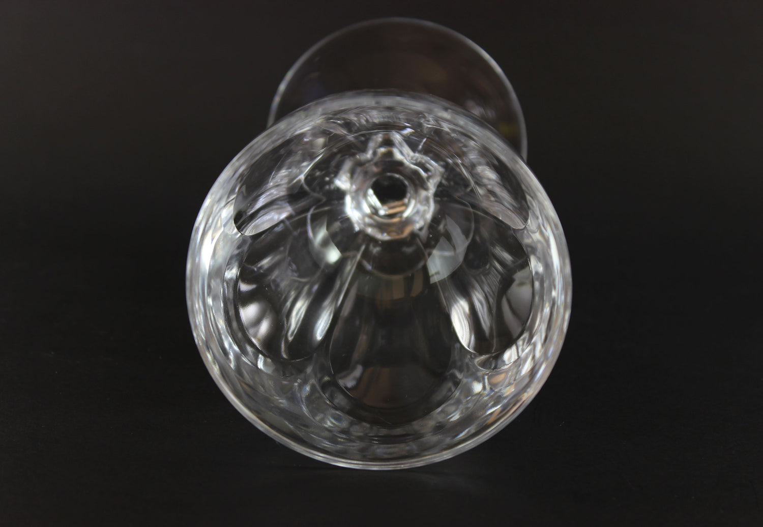 Clear crystal goblet on a black background