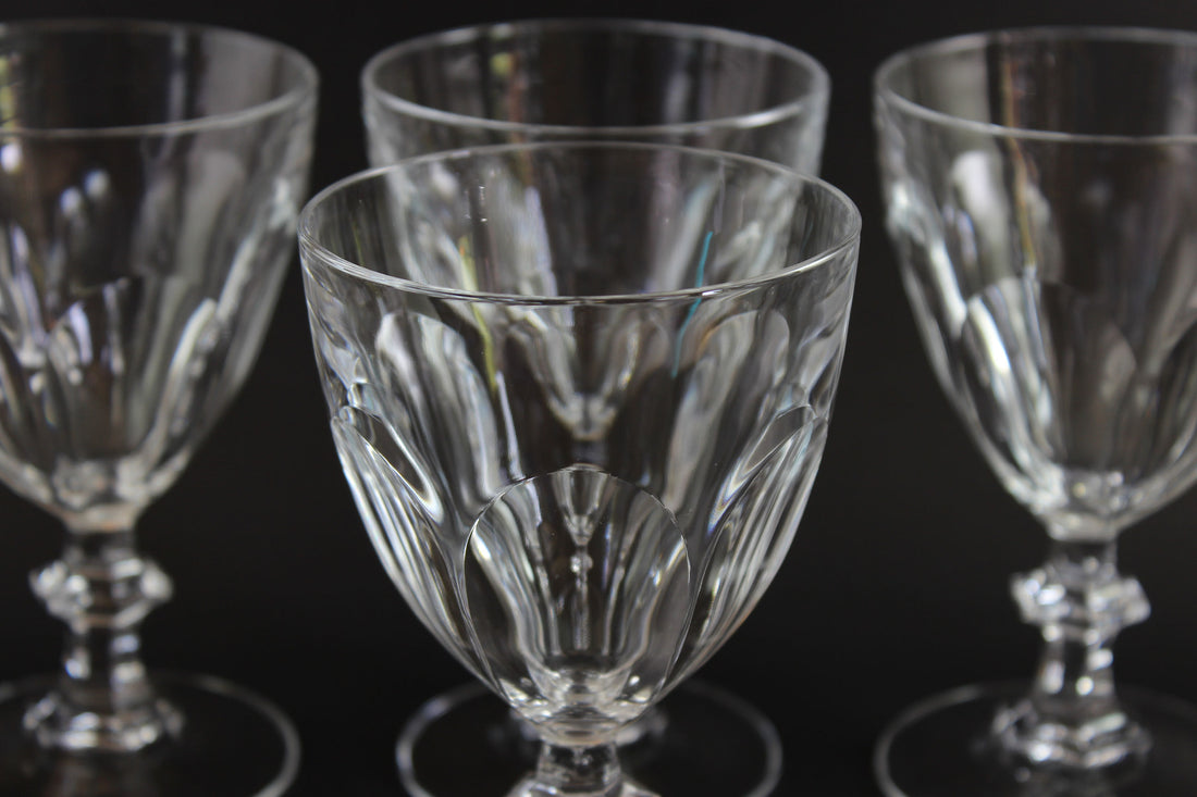 Clear, crystal Claret glasses on black background.