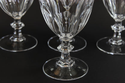 Clear, crystal Claret glasses on black background.