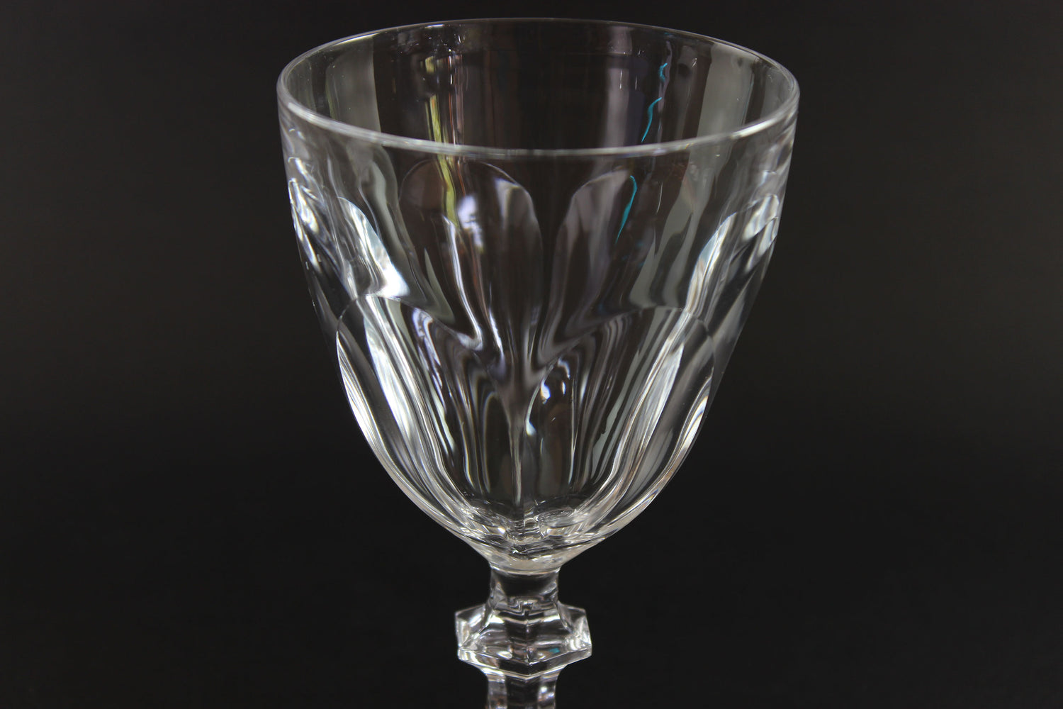 Clear crystal goblet on a black background