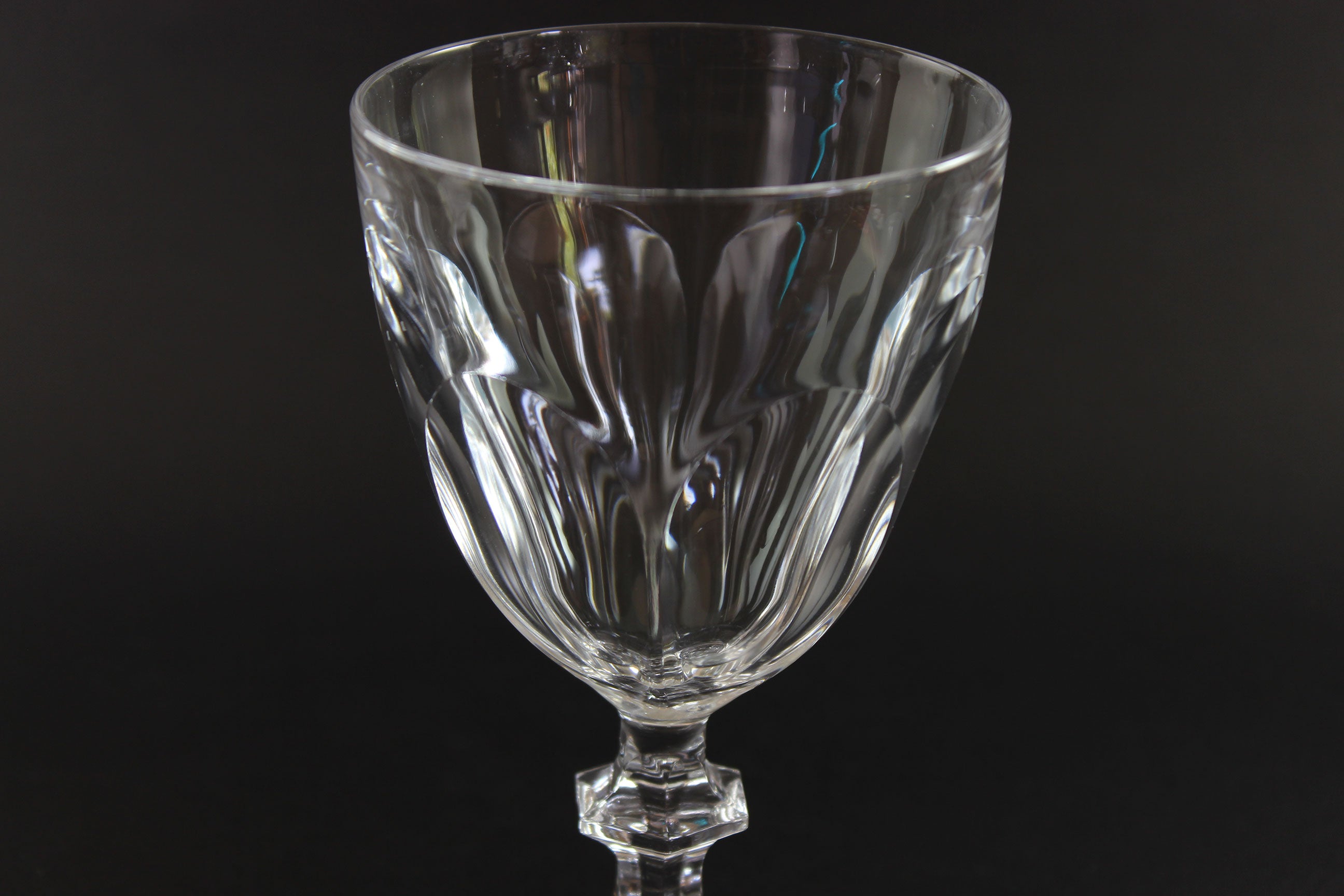 Clear crystal goblet on a black background
