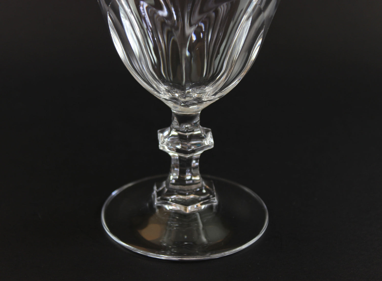Clear crystal goblet on a black background