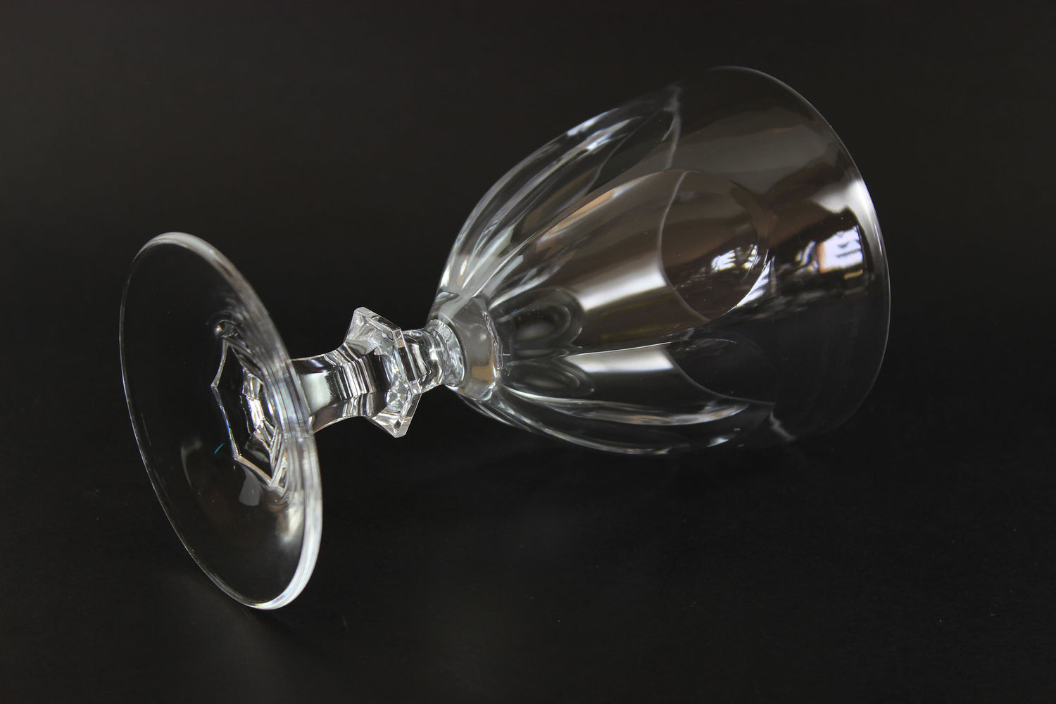 Clear crystal goblet on a black background