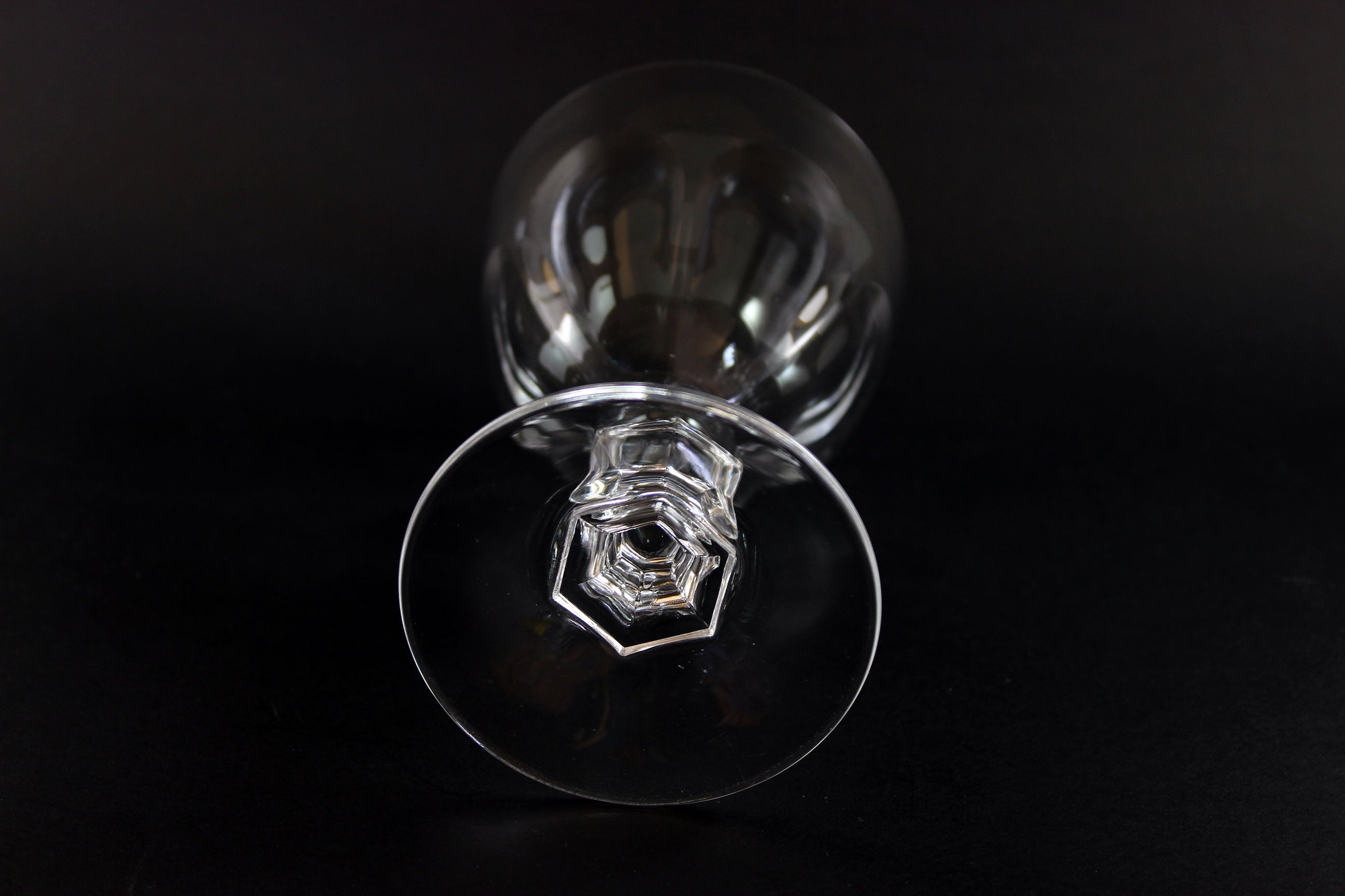 Clear crystal goblet on a black background