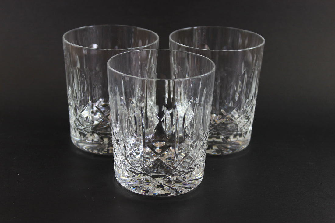Cut Crystal Whiskey Glass on Black Background