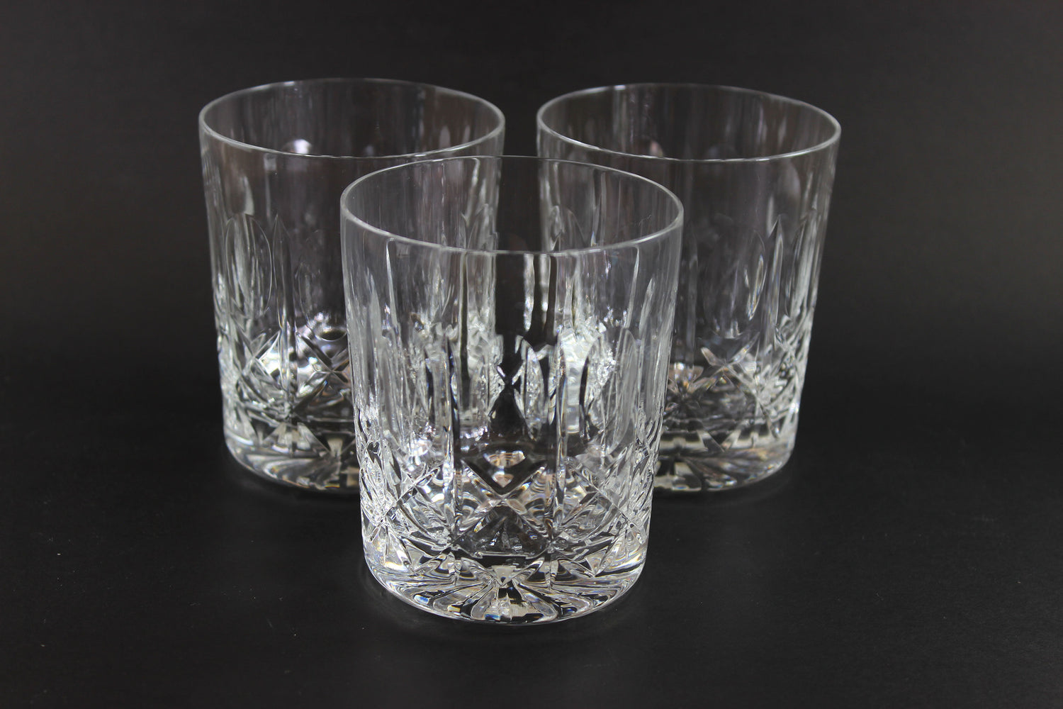 Cut Crystal Whiskey Glass on Black Background