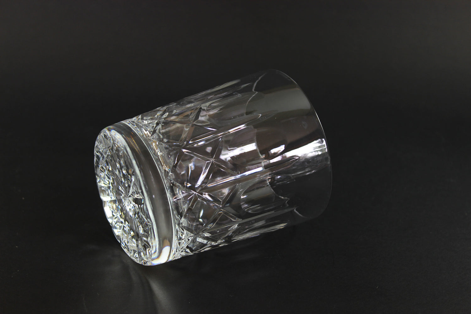 Cut Crystal Whiskey Glass on Black Background