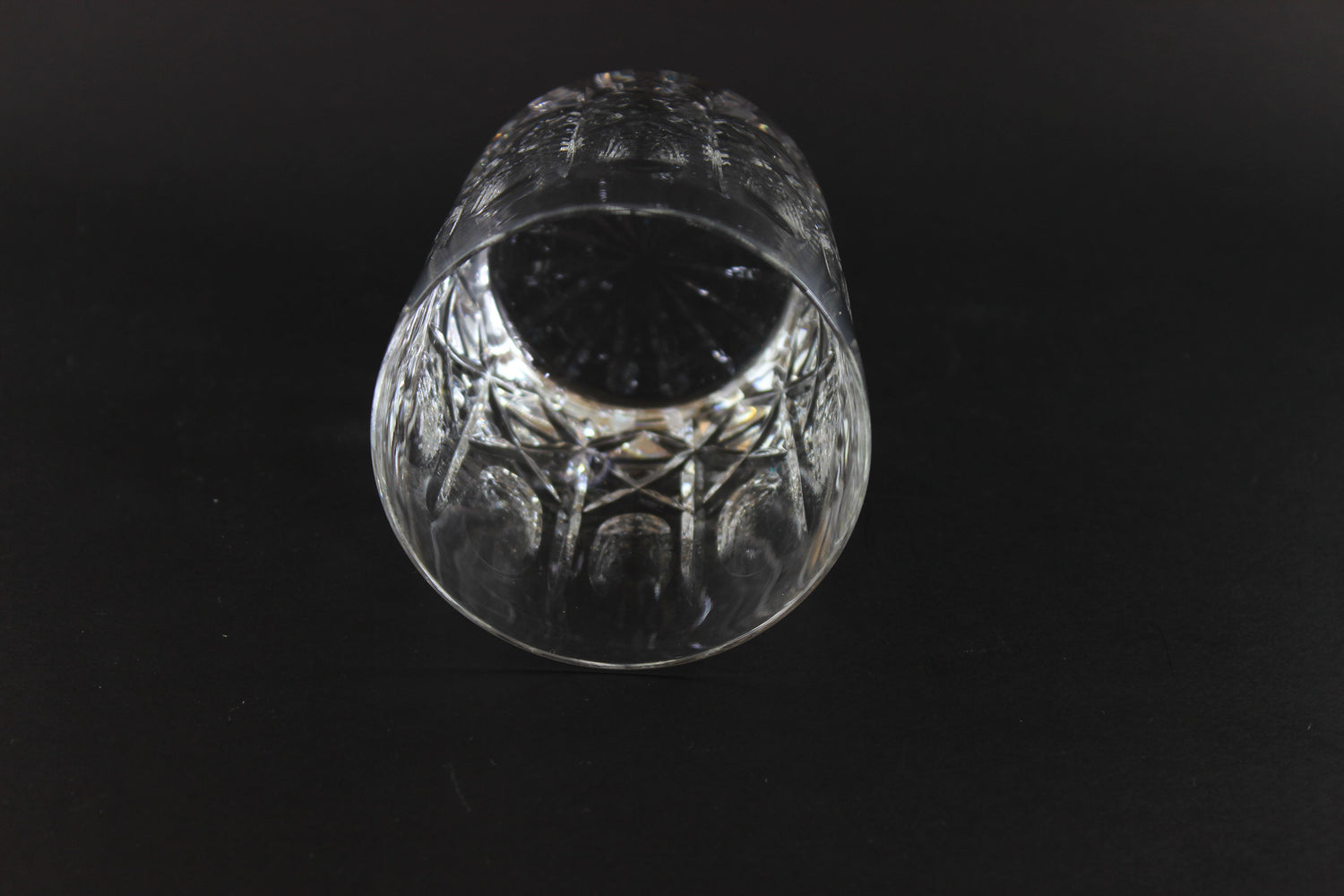 Cut Crystal Whiskey Glass on Black Background
