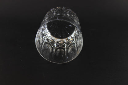 Cut Crystal Whiskey Glass on Black Background