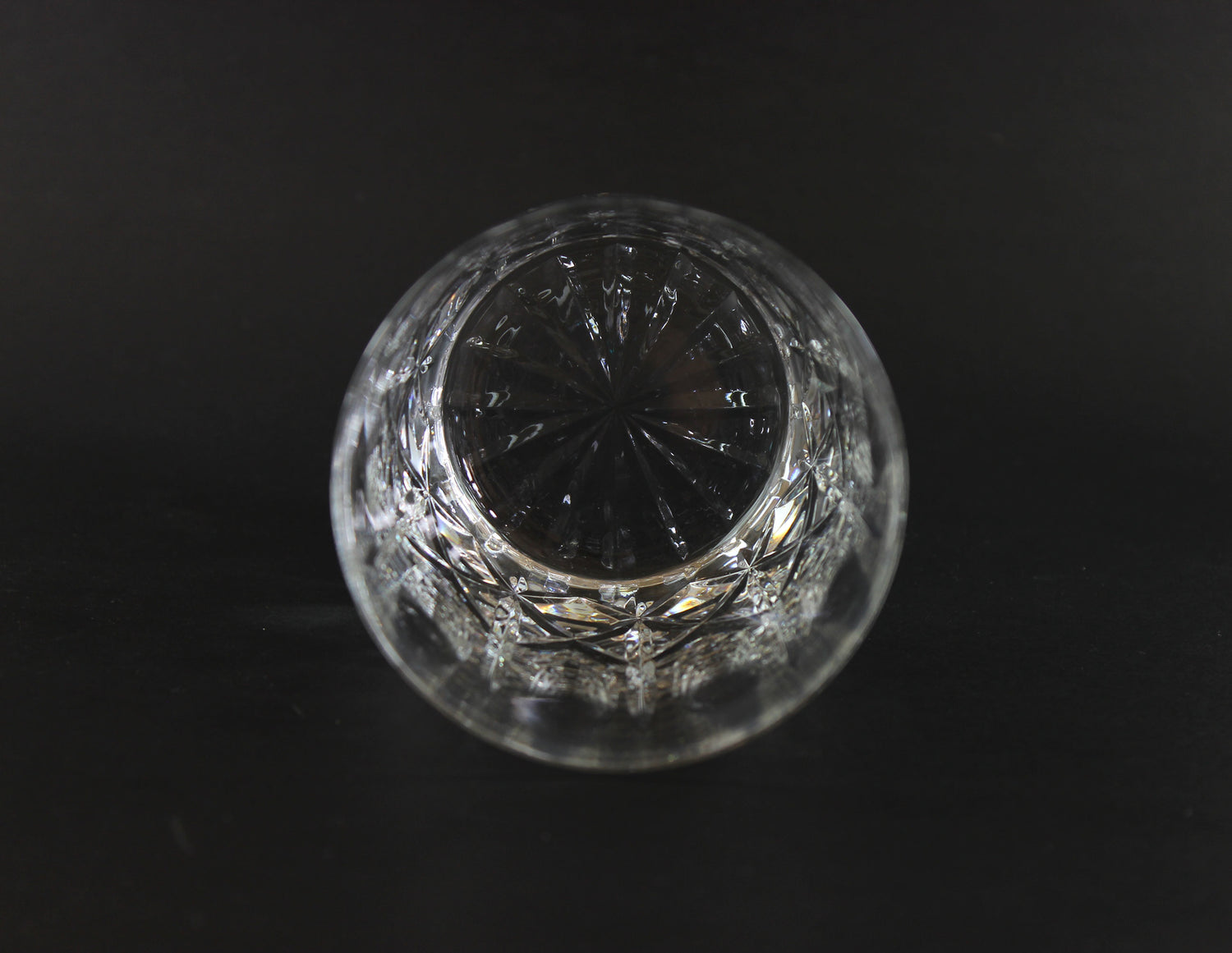 Cut Crystal Whiskey Glass on Black Background