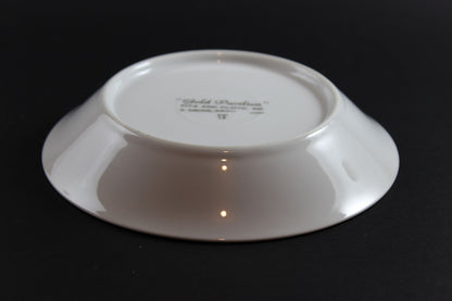White ceramicbowl with &