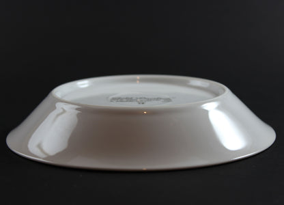 White ceramic bowl on a black background