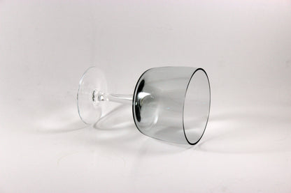 Set of smoked glass port glasses on a white background