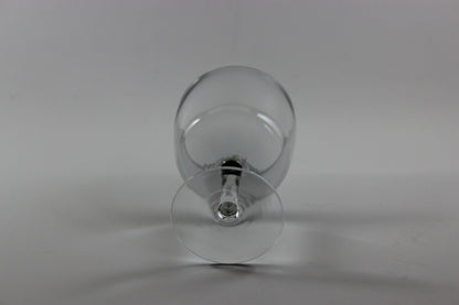 Set of smoked glass port glasses on a white background