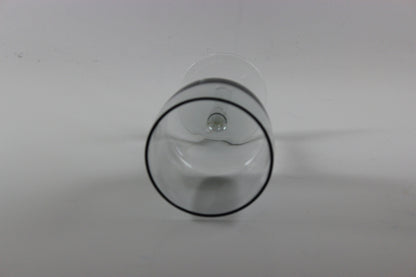 Set of smoked glass port glasses on a white background
