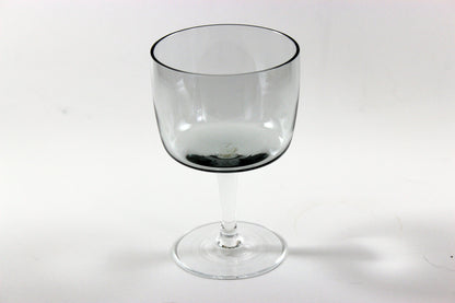 Set of smoked glass port glasses on a white background
