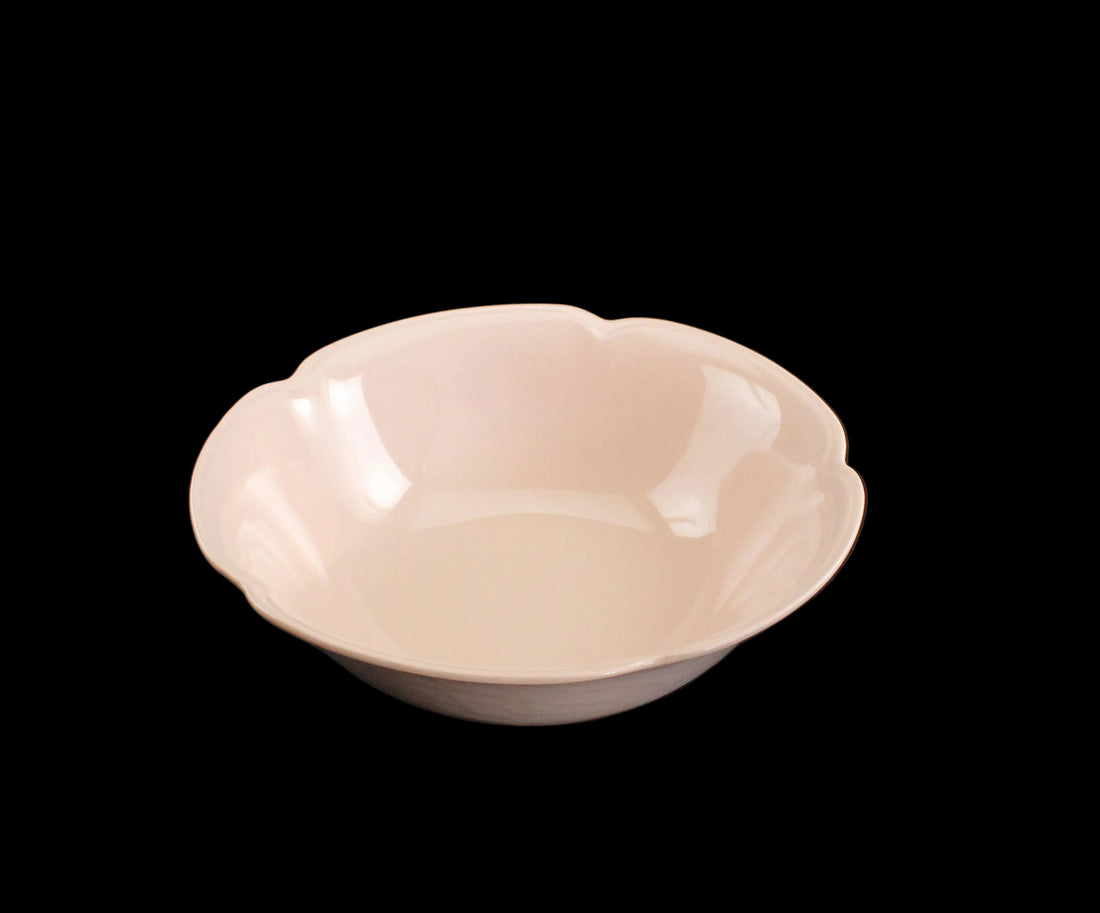 Rose ceramic bowl on a black background