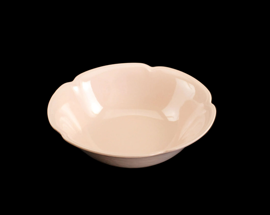 Rose ceramic bowl on a black background