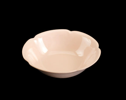 Rose ceramic bowl on a black background