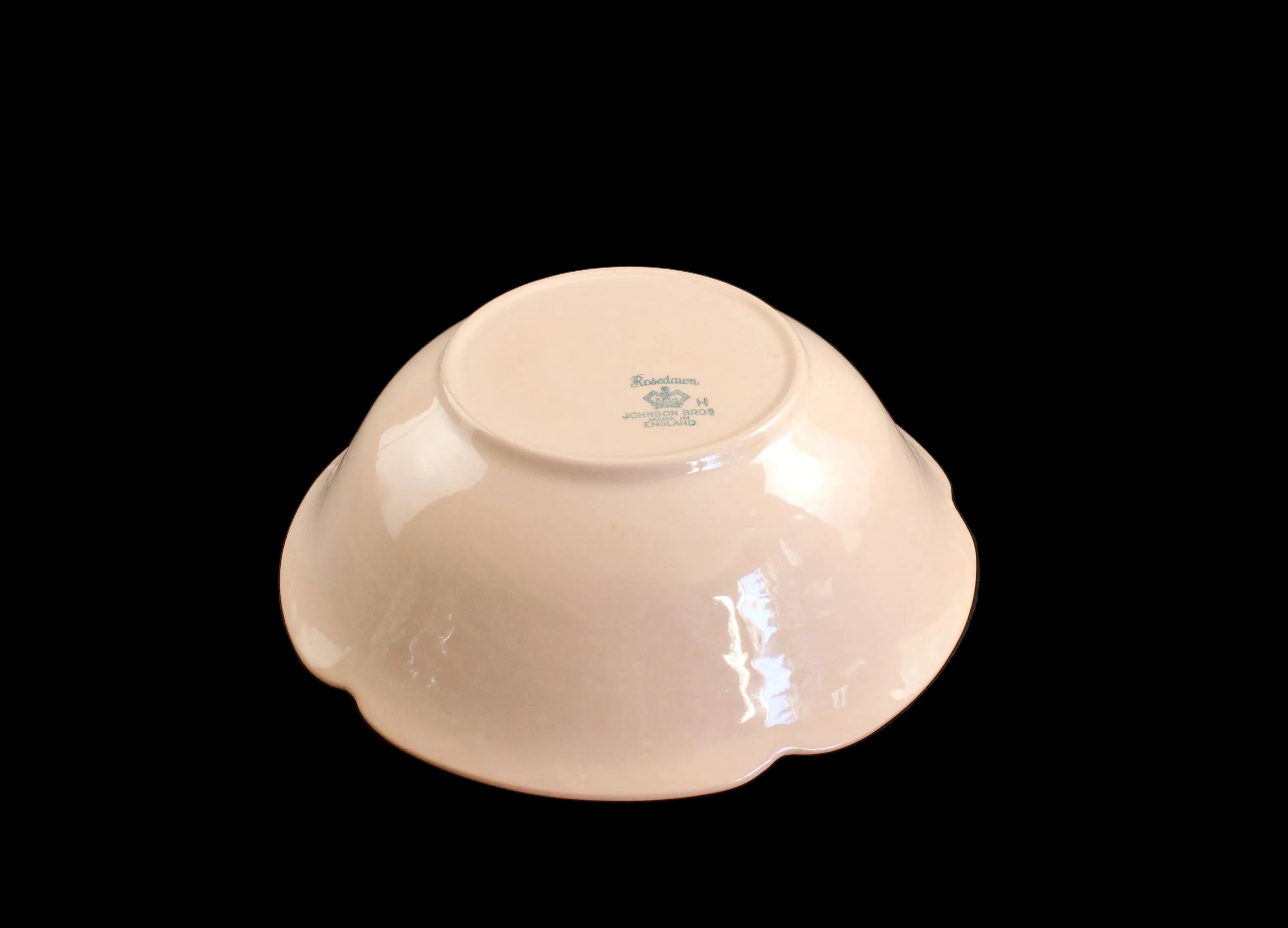 Rose ceramic bowl on a black background