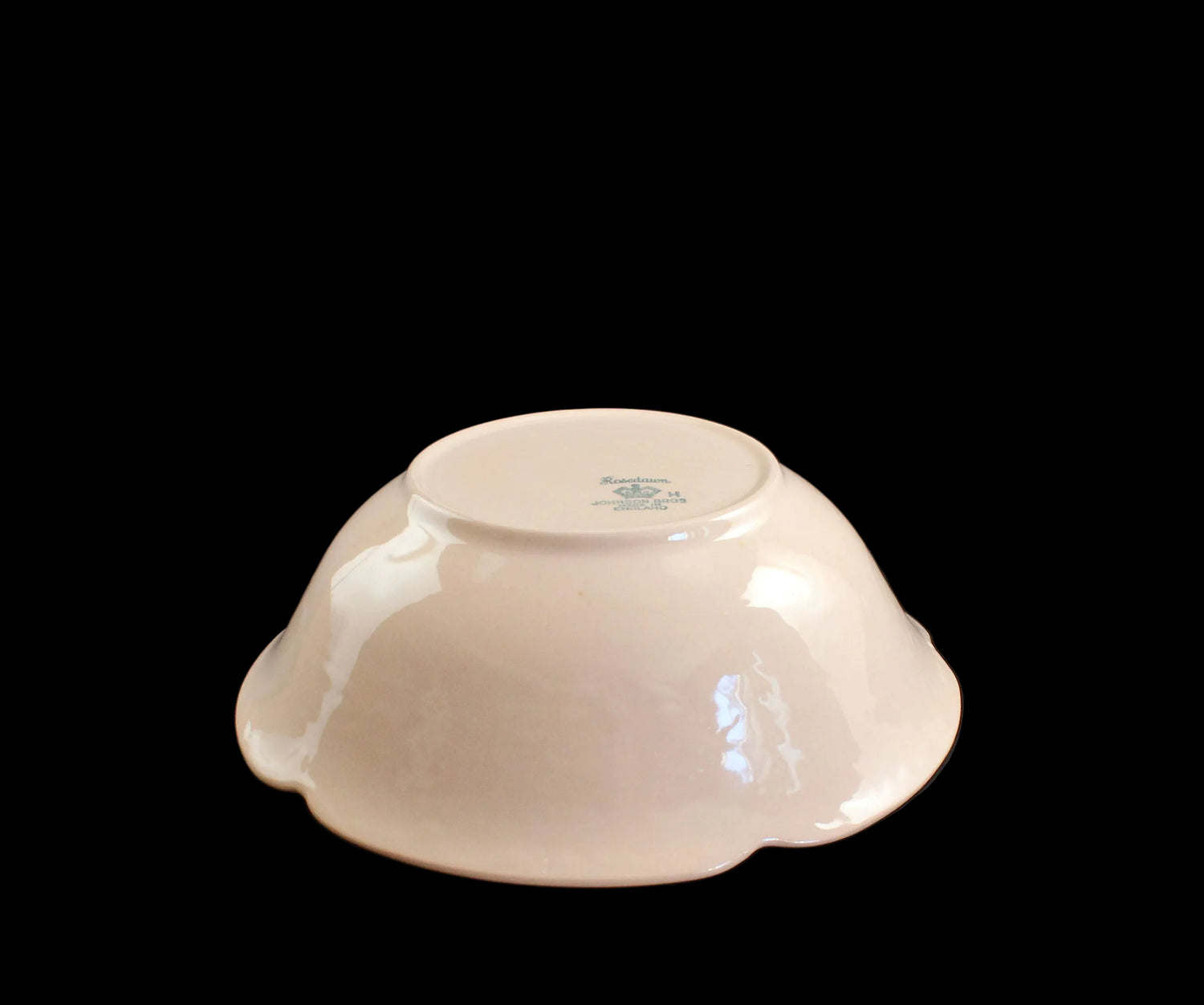 Rose ceramic bowl on a black background